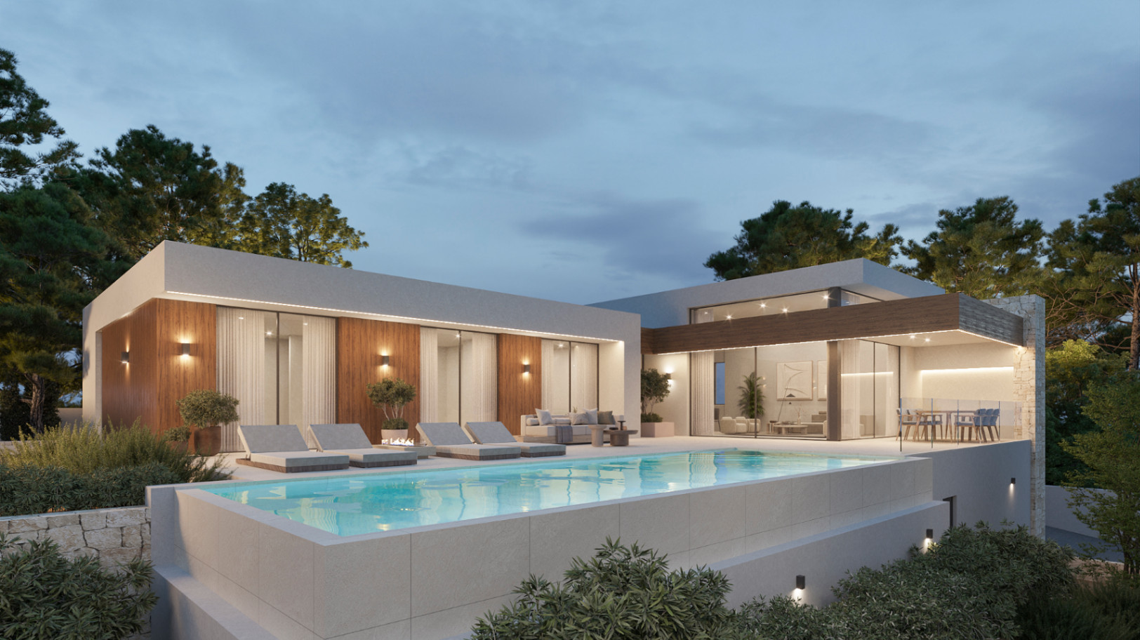 Abendliche Außenansicht der Villa mit Infinity-Pool, Holzfassaden und bodentiefen Glasfronten. Die Terrasse bietet integrierte Beleuchtung, Sonnenliegen und einen Essbereich.
