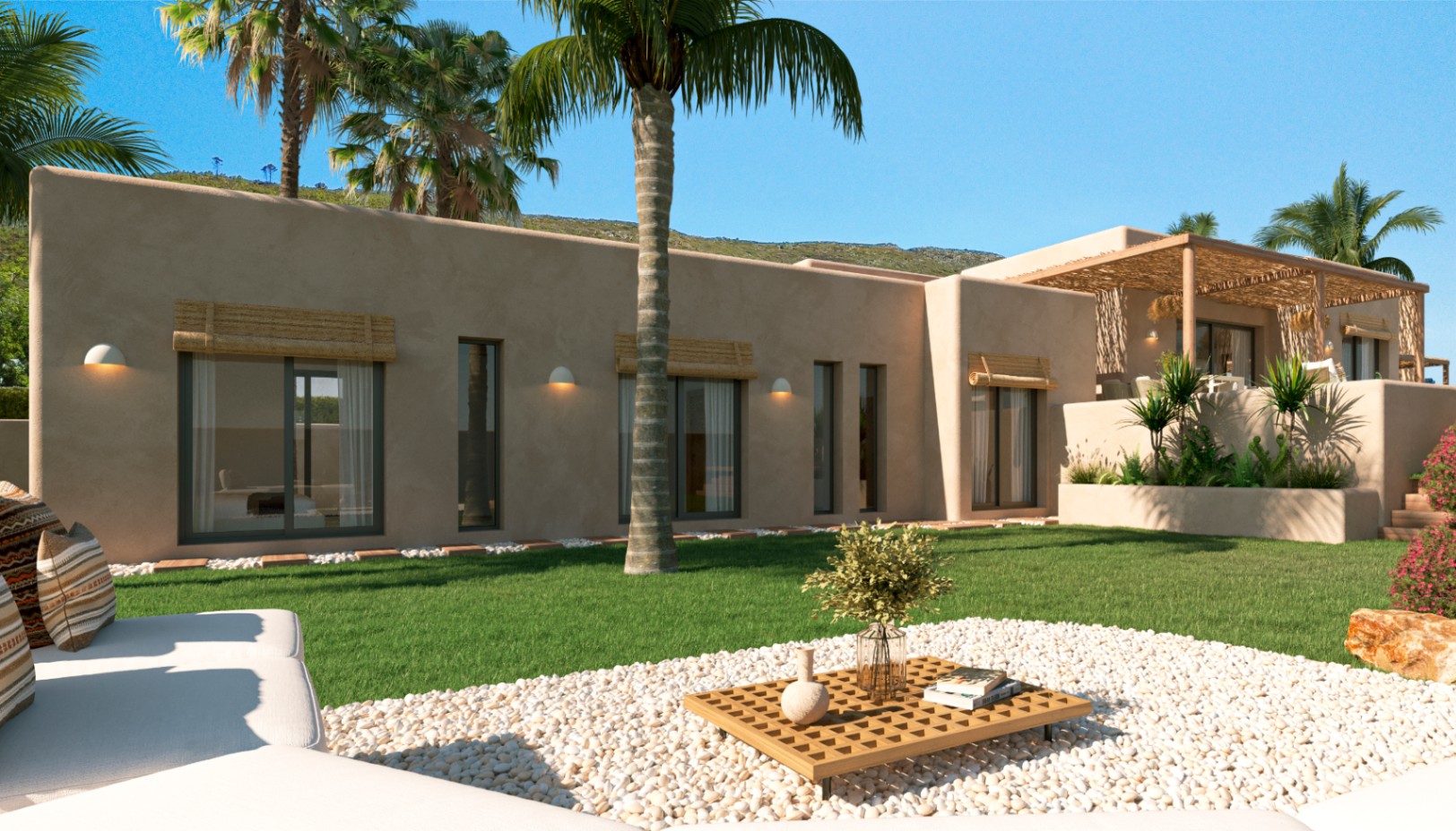 Mediterrane Fassade in Erdtönen mit großen Fenstern, Naturfaser-Jalousien und einem gepflegten Garten mit Palmen und Loungebereich auf weißem Kies.