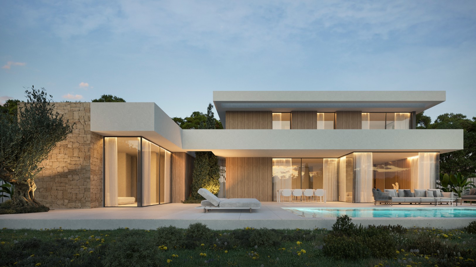 Moderne Fassade im Ibiza-Stil mit Natursteinwänden, bodentiefen Fenstern, privatem Pool und Loungebereichen bei stimmungsvoller Abendbeleuchtung.