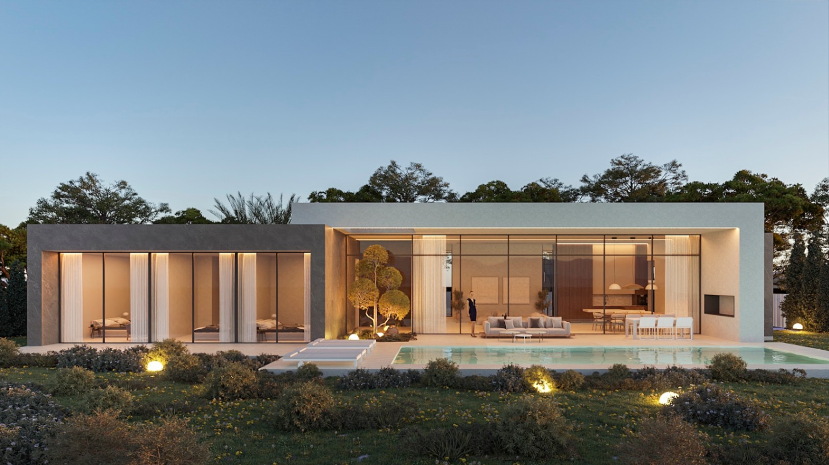 Zeitgenössische Villenfassade mit raumhohen Glasfronten, 52 m² Pool und beleuchtetem Garten. Die Architektur kombiniert Steinelemente mit weißen Flächen und warmem Licht.