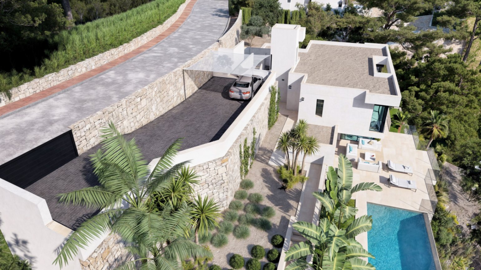 Luftaufnahme der privaten Zufahrt mit Natursteinmauern, Carport und der unteren Terrasse mit Infinity-Pool sowie mediterraner Gartenanlage.