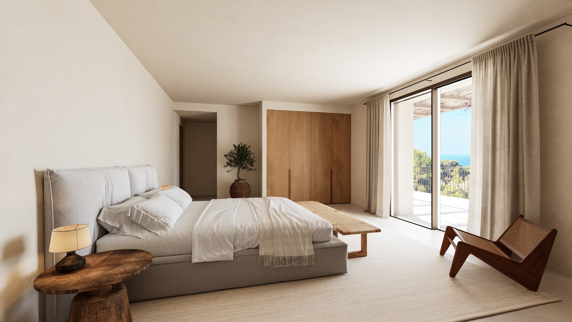 Hauptschlafzimmer mit integrierten Eichenschränken, minimalistischen Holzmöbeln und raumhohen Glasschiebetüren mit Blick auf das Mittelmeer.