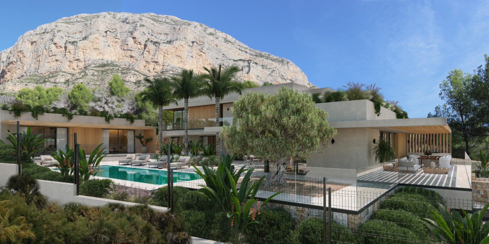 Außenansicht der Villa mit türkisfarbenem Pool, Steinterrasse und mediterranem Garten vor der Kulisse des Berges Montgó in Jávea.