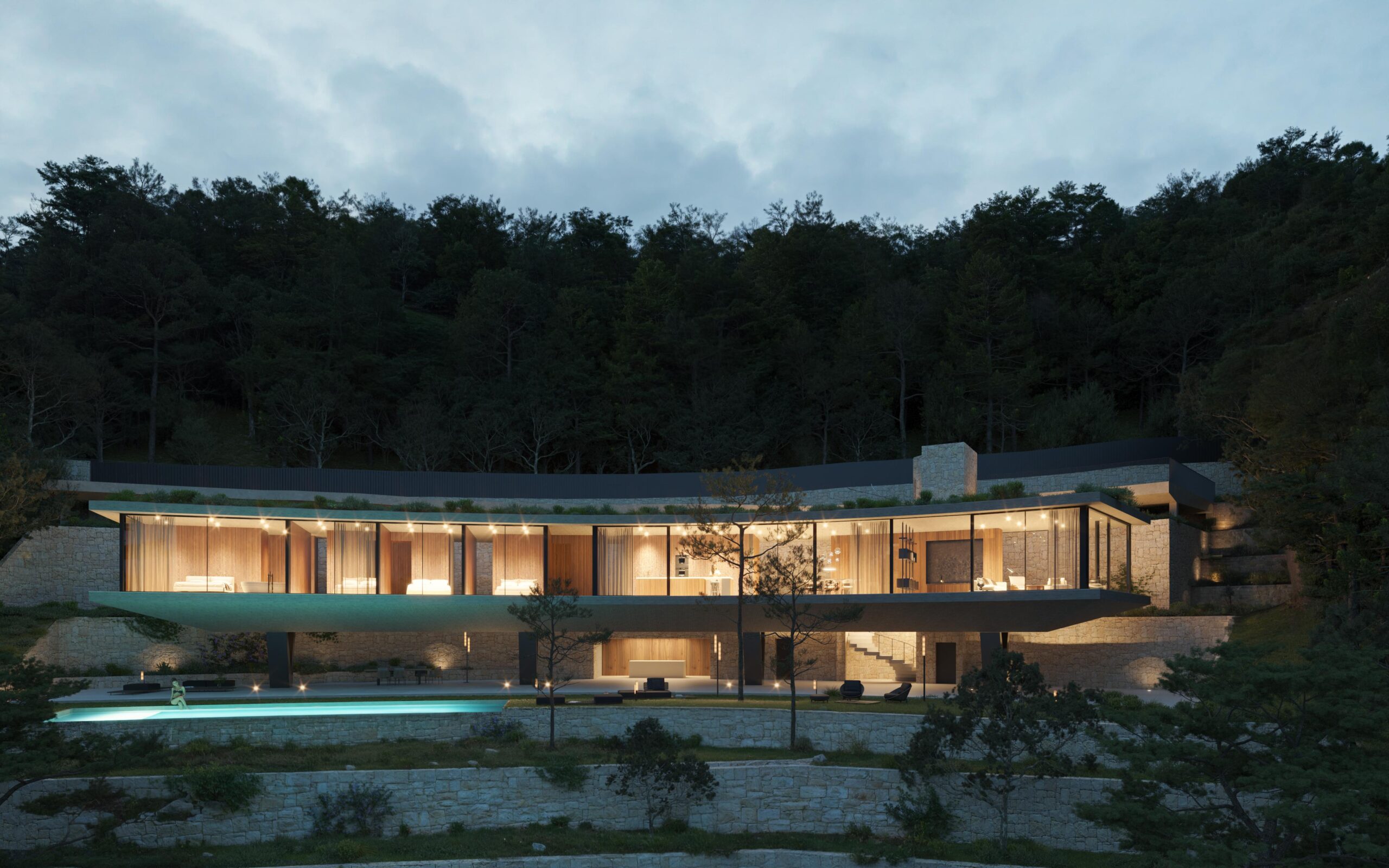 Moderne Kragarm-Villa mit raumhohen Glasfronten und Holzinterieur, eingebettet in einen bewaldeten Hang mit Natursteinmauern und beleuchtetem Pool.