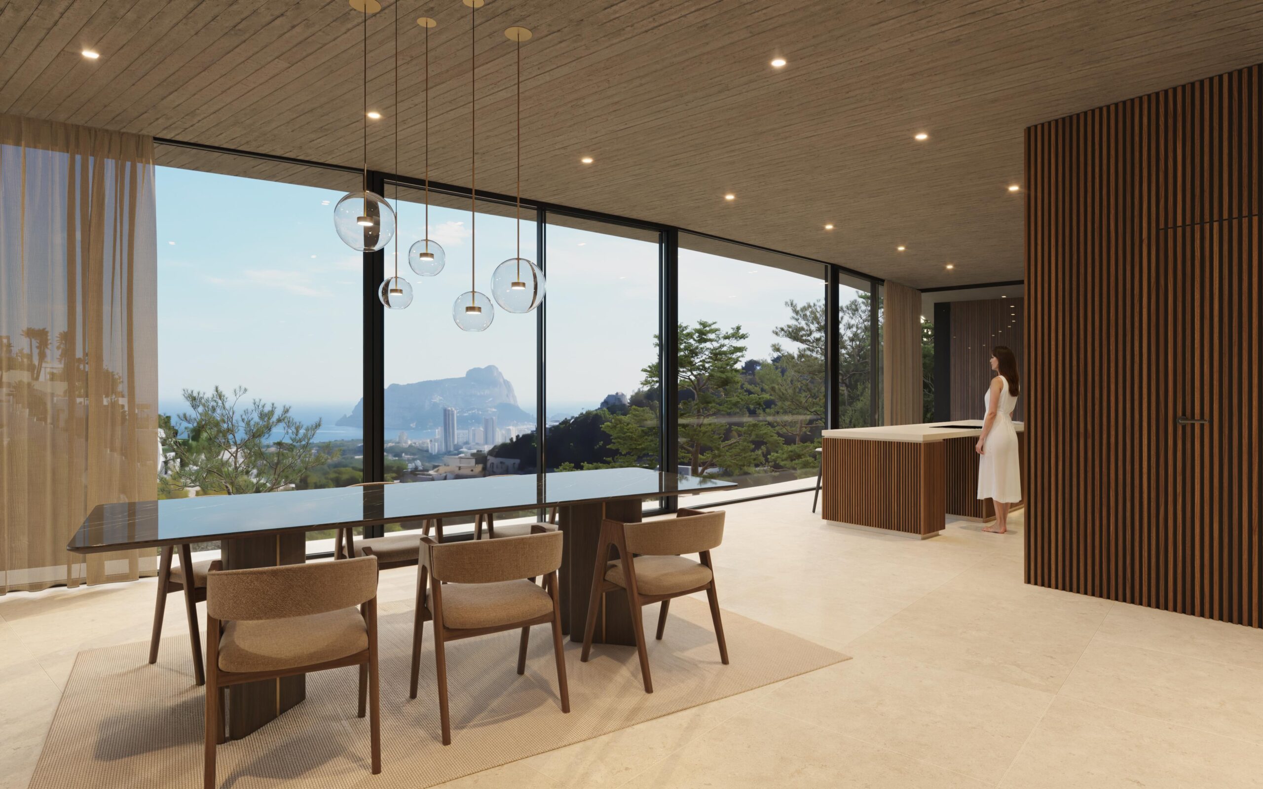 Offener Essbereich mit schwarzem Marmortisch, Glaskugel-Pendelleuchten und Panoramafenstern mit Blick auf den Peñón de Ifach und die Mittelmeerküste.