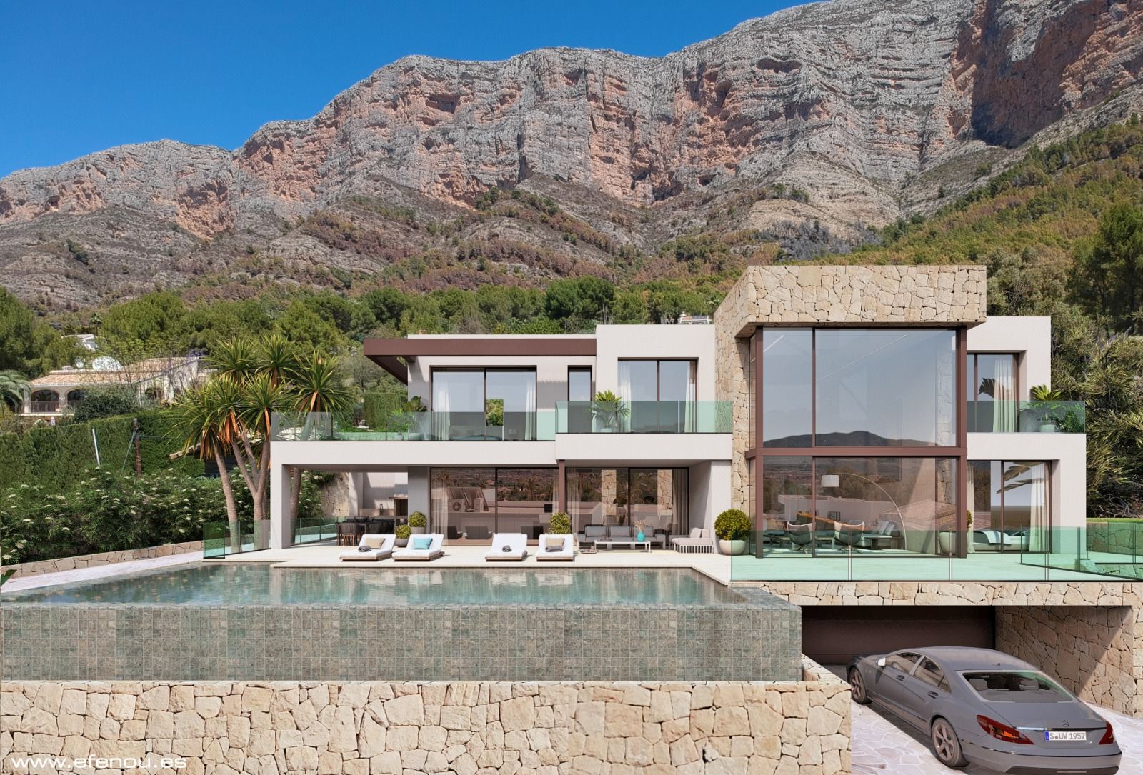 Moderne Villa mit Natursteinfassade, bodentiefen Fenstern und Infinity-Pool vor der beeindruckenden Kulisse des Montgó-Massivs in Jávea.