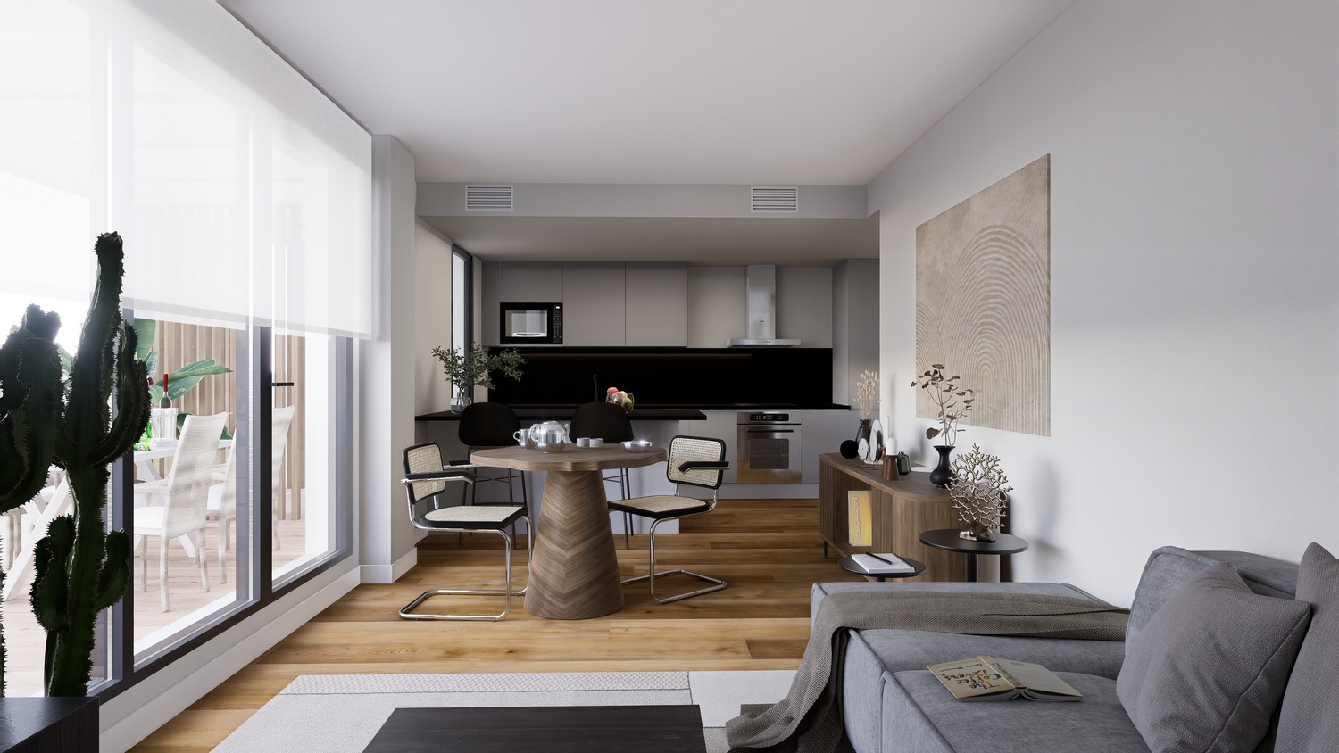 Offener Wohnbereich mit moderner grauer Küche, Essplatz aus Holz und Eichenparkett. Große Glasfronten bieten direkten Zugang zur privaten Terrasse.