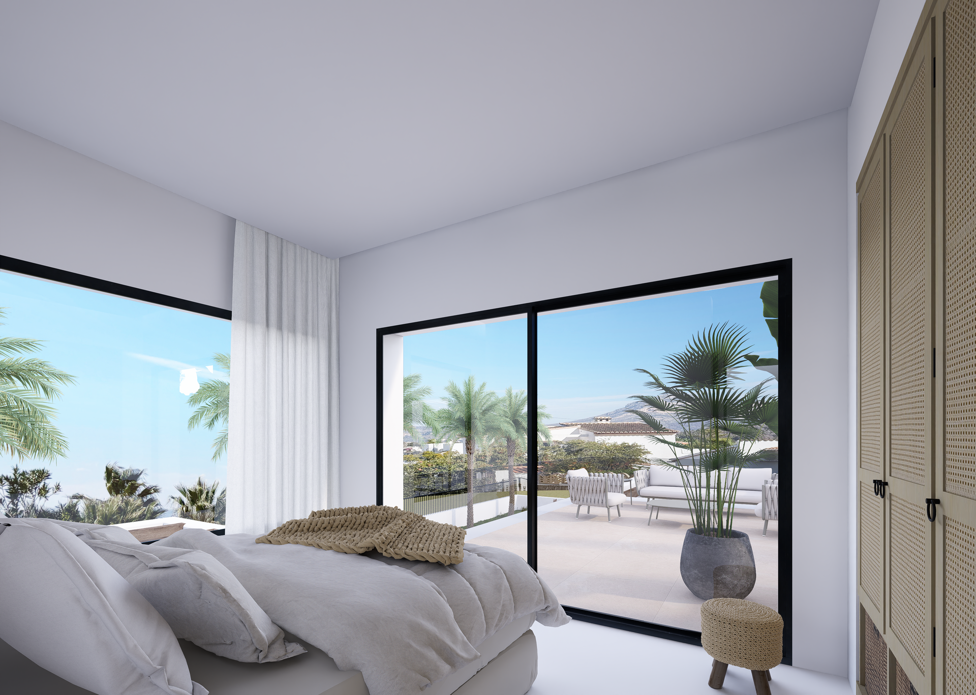 Modernes Schlafzimmer mit bodentiefen Schiebetüren zur Terrasse. Ausgestattet mit Einbauschränken mit Rattandetails und Blick auf das Montgó-Massiv.