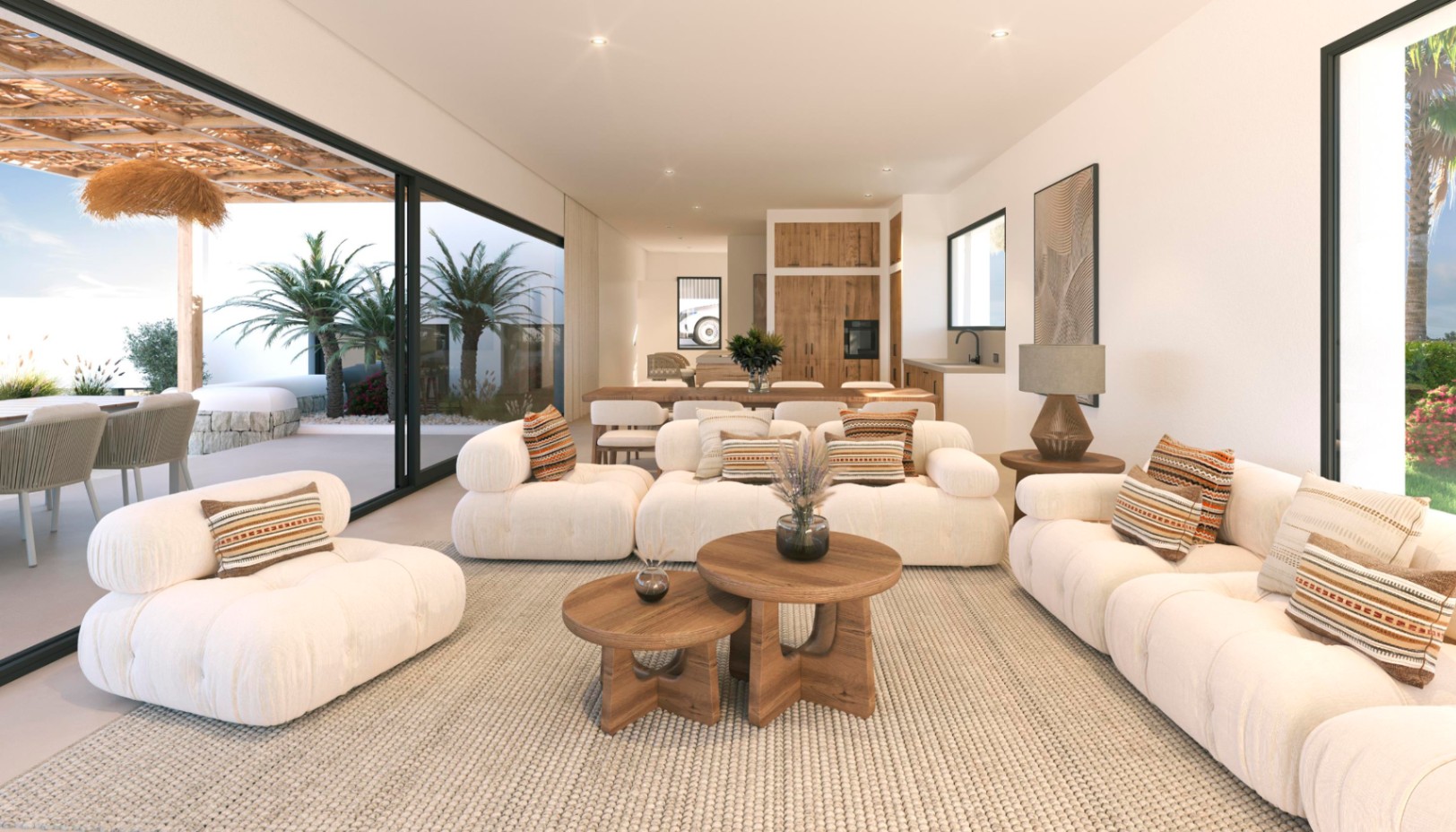 Offener Wohnbereich mit weißen Modulsofas, Holztischen und bodentiefen Glasfronten, die einen nahtlosen Übergang zur Terrasse und dem Garten ermöglichen.