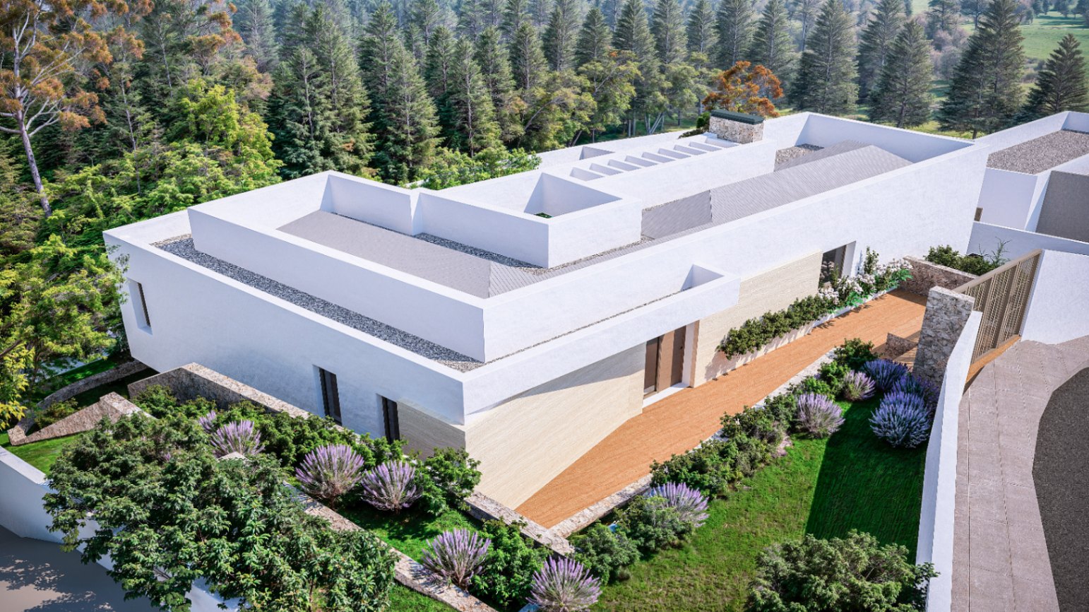 Luftaufnahme der modernen Villa mit geraden Linien, weißen Fassaden und Natursteinmauern, eingebettet in einen Garten mit Lavendel und Pinienwald.